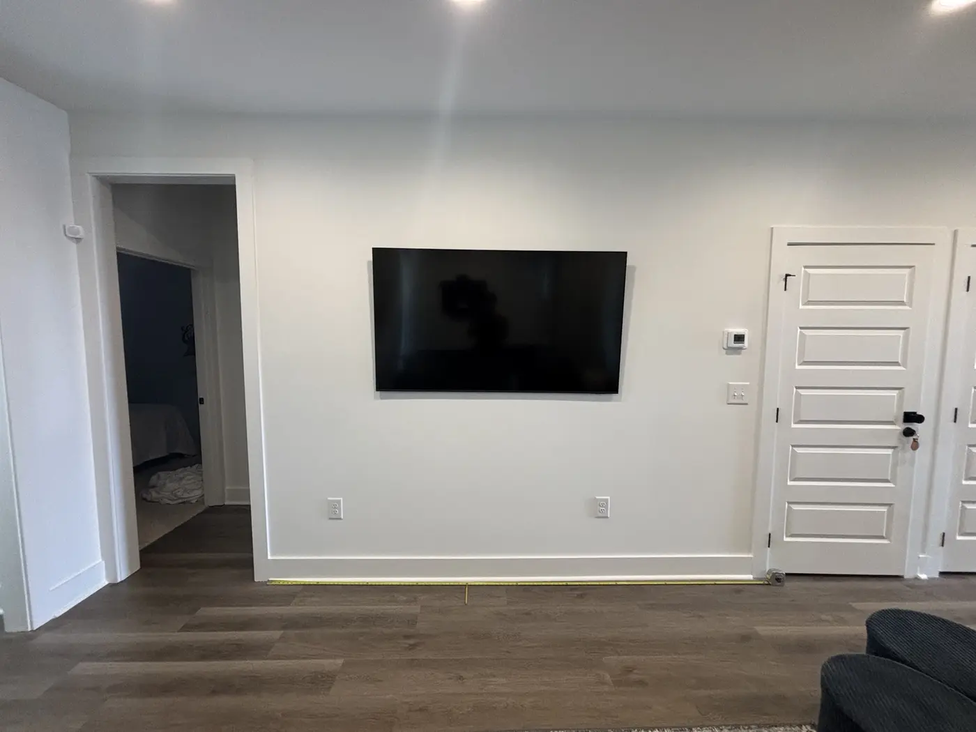 Existing living room wall before construction